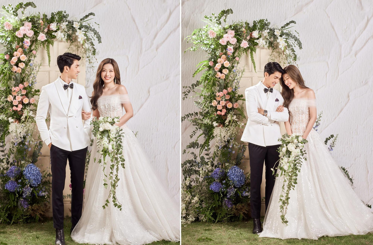 Trong loạt ảnh mới cặp diễn viên - á hậu diện trang phục cưới sang trọng, thanh lịch, tạo dáng trong bối cảnh tràn ngập hoa tươi.