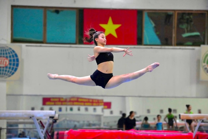 Nét quyến rũ của bóng hồng thể dục dụng cụ Phạm Như Phương - Hình 7 Net quyen ru cua bong hong the duc dung cu Pham Nhu Phuong-Hinh-7