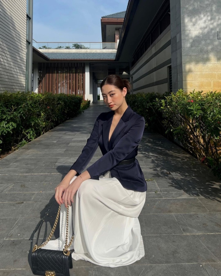 Hoa hậu Lương Thuỳ Linh mặc 'kín' khi trở thành giảng viên - Hình 10 Hoa hau Luong Thuy Linh mac 'kin' khi tro thanh giang vien-Hinh-10