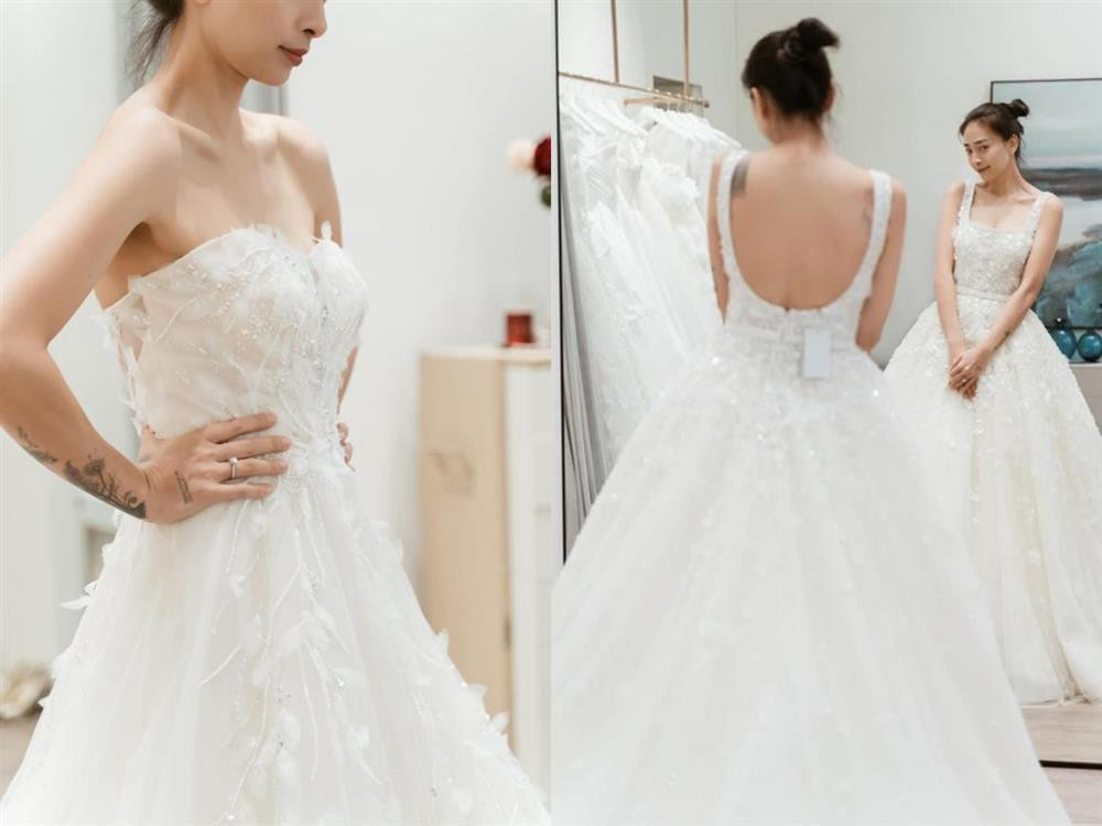 Các cô dâu Vbiz khoe hình xăm độc lạ khi mặc váy cưới - Hình 4 Cac co dau Vbiz khoe hinh xam doc la khi mac vay cuoi-Hinh-4