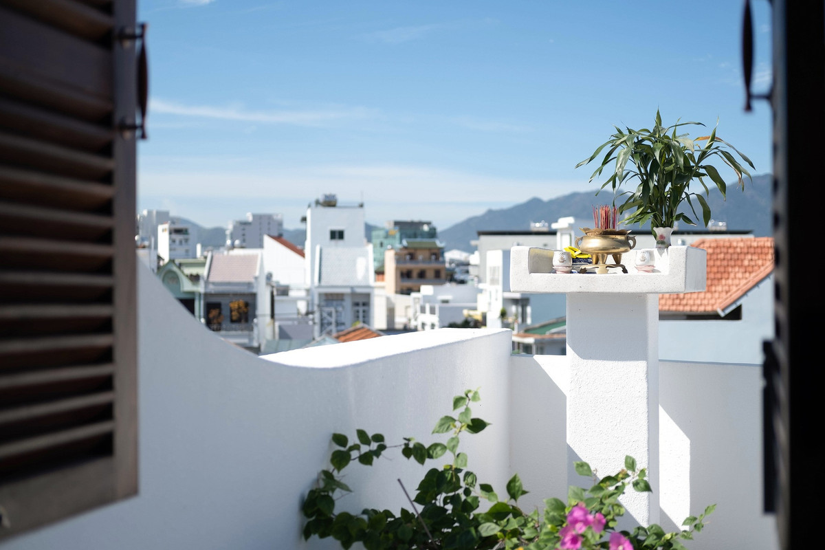 Nhà hẻm ở Nha Trang sử dụng đường cong bất định - Hình 21 Nha hem o Nha Trang su dung duong cong bat dinh-Hinh-21