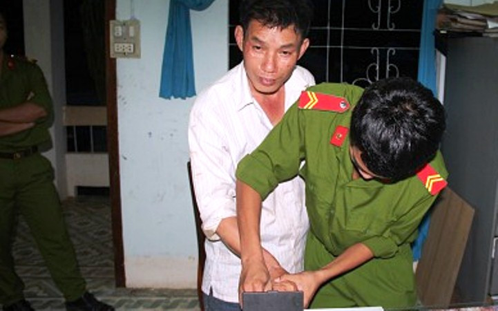 Hung thủ Trương Văn Thâm tại cơ quan điều tra.