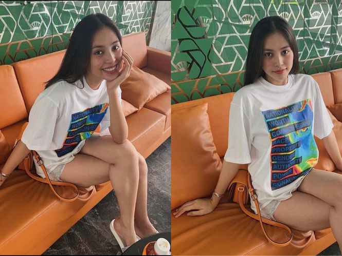 ##s###Mốt áo phông "giấu" quần chắc chắn không thể thiếu trong mùa hè. Lựa chọn những chiếc áo dáng rộng và quần short khoe chân thon dài, Tiểu Vy ghi điểm với vẻ năng động lại không kém phần quyến rũ