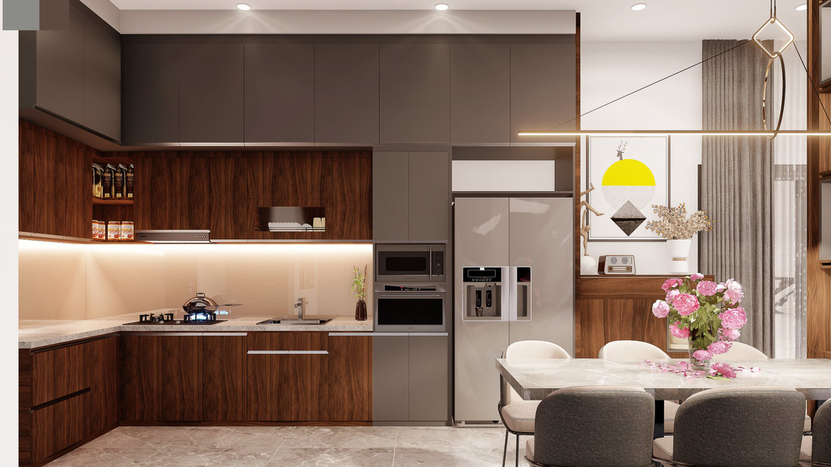 Phòng bếp dùng gam màu xám nhạt. Bộ bàn ăn được đặt ngay cạnh kệ trang trí, có thể quan sát bên ngoài khi ăn uống. Nơi đây cho cả gia đình, bạn bè… ngồi bên nhau thưởng thức những bữa cơm ngon, bồi đắp tình cảm.