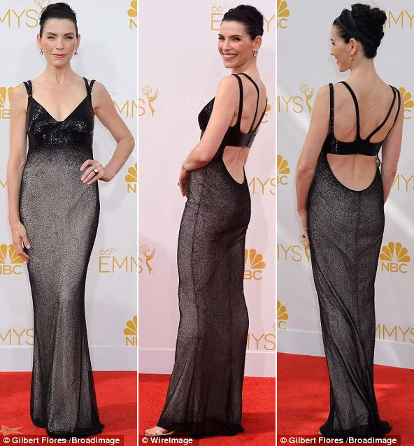 Julianna Marguilies càng lộ vẻ gày gò trong chiếc váy hai màu đen-ghi chất vải chảy.