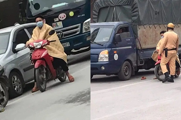 Khoác chăn ra đường chống rét, thanh niên bị công an “sờ gáy“ Khoac chan ra duong chong ret, thanh nien bi cong an “so gay“