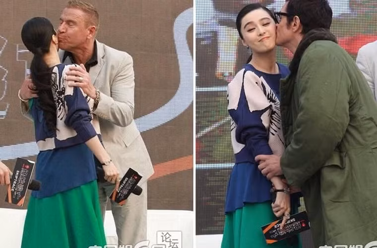 Hai nam đồng nghiệp trong đoàn phim hành động "Skiptrace" tranh thủ ôm hôn Phạm Băng Băng thắm thiết trong buổi giới thiệu phim.