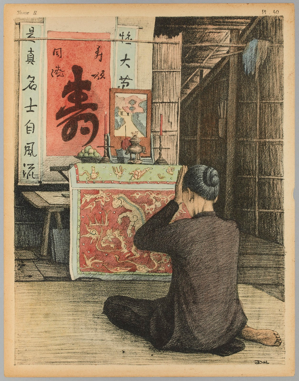 Người phụ nữ khấn vái trước bàn thờ.