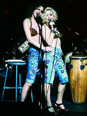 Bộ đồng phục với bạn diễn Sandra Bernhardt trong màn trình diễn ca khúc "I got you babe" tại lễ từ thiện ủng hộ nạn nhân AIDS năm 1989 của Madonna khiến khán giả kinh ngạc. Đây có lẽ là một trong những bộ trang phục trình diễn ấn tượng nhất của cô. Cả áo và quần có được đều là do màu vẽ trên thân thể của hai nữ nghệ sĩ.