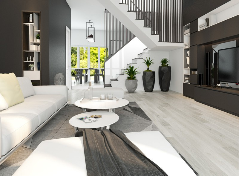 Sàn gỗ màu sáng kéo dài từ khu vực phòng khách cho đến nhà bếp.