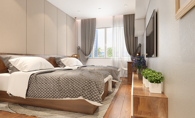 Phòng ngủ trẻ em sở hữu hai chiếc giường gỗ, cùng màu sắc tươi sáng hơn.