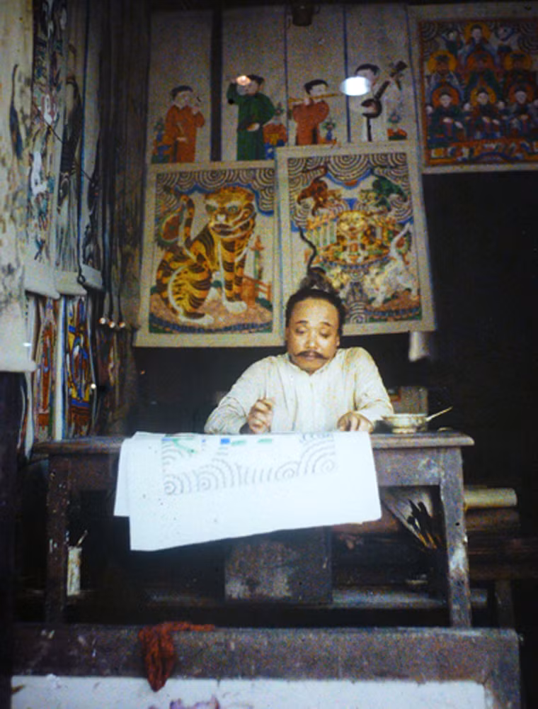 Nghệ nhân vẽ tranh Hàng Trống.