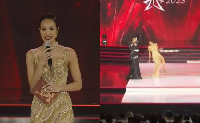 rước Quỳnh Anh Shyn, nhiều sao Việt cũng từng khiến khán giả "thót tim" khi gặp sự cố. Trong ảnh là khoảnh khắc MC Phương Mai vấp váy trên sân khấu chung kết Miss Charm 2023. Bằng sự chuyên nghiệp, người đẹp nhanh chóng lấy lại tinh thần và tiếp tục tự tin dẫn chương trình.