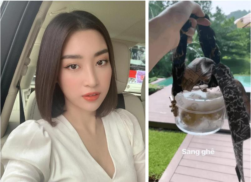 ##ss###style="text-decoration: underline;">Đỗ Mỹ Linh cầm trên tay chiếc túi hộp đến từ nhà mốt Louis Vuitton nhưng thay vì sử dụng với mục đích gốc là đựng đồ makeup, trang sức hay tô điểm cho một bộ cánh thời trang nào đó thì nàng hậu 23 tuổi lại dùng để đựng táo