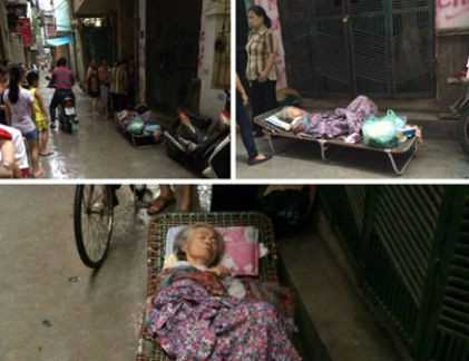 Hình ảnh bà Nguyễn Thị Tú nằm ngoài cửa nhà gây xôn xao dư luận trước đó.