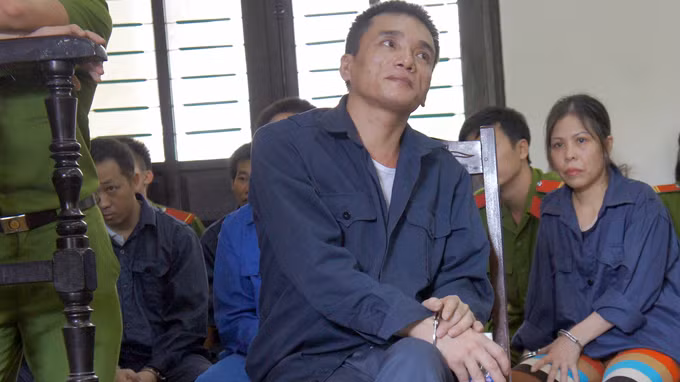 Tại phiên tòa, ông trùm ma túy Nguyễn Trọng Tuấn vẫn nở nụ cười mỉm khi bản thân phải nhận mức án tử hình.