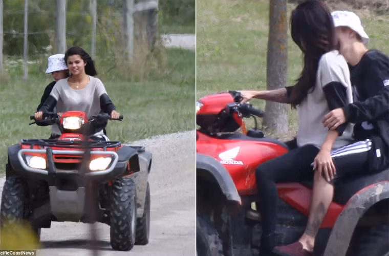 Hai ngôi sao ôm chặt lấy nhau trên xe, vừa đi cả hai vừa nói chuyện rất vui vẻ.