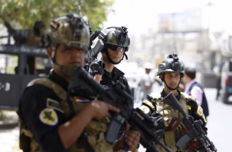 Thành viên của lực lượng Đặc nhiệm Iraq triển khai ở quận Amiriya, thành phố Baghdad ngày 18/6/2014.