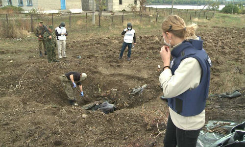 Ngôi mộ tập thể gần Donetsk.
