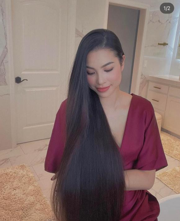 Không chỉ làn da, nàng hậu còn ghi điểm với mái tóc óng ả đen mượt ở tuổi 30.