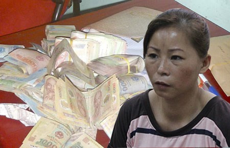 Đoàn Thị Cúc và tang vật. Ảnh: CTV.