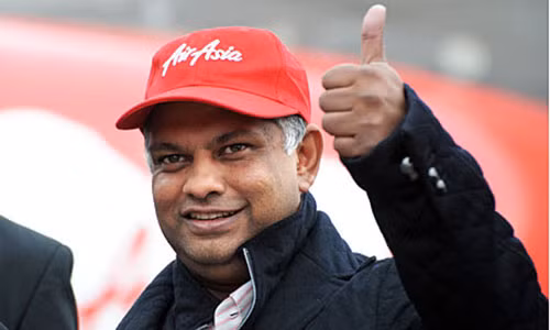 Vào năm 2001, ở tuổi 37, ông dấn thân vào ngành hàng không bằng việc mua lại Air Asia với chỉ 1 ringgit (tức khoảng 0,2 USD) cùng với khối nợ lớn mà hãng này đã phải gánh chịu. Theo tạp chí Forbes, tổng giá trị tài sản cá nhân mà ông có lên đến khoảng 620 triệu USD. Vào năm 2011, ông được phong tặng huân chương danh giá nhất nước Anh CBE.