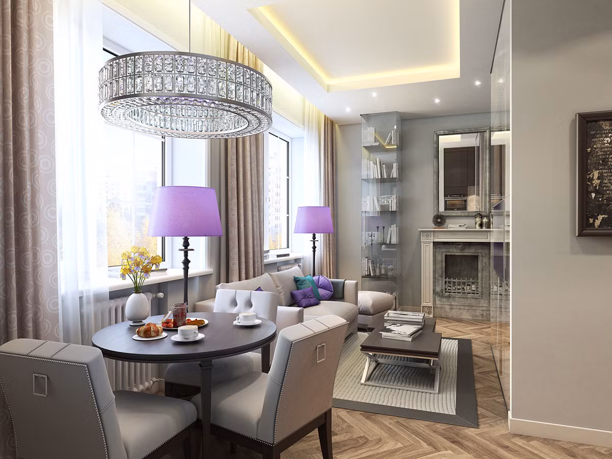 Nó có một số yếu tố cổ điển hơn với một đèn chùm pha lê và bộ ghế ăn màu trắng.