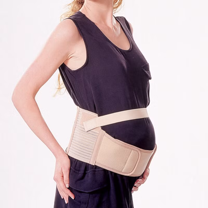 Sử dụng đai nâng bụng. Để hỗ trợ việc nâng đỡ cho chiếc bụng to quá khổ của mình, bạn có thể sử dụng đai đeo bụng loại dùng cho những người đang mang thai. Nó tỏ ra đặc biệt hiệu quả đối với các chị em ngồi làm việc trong thời gian dài.