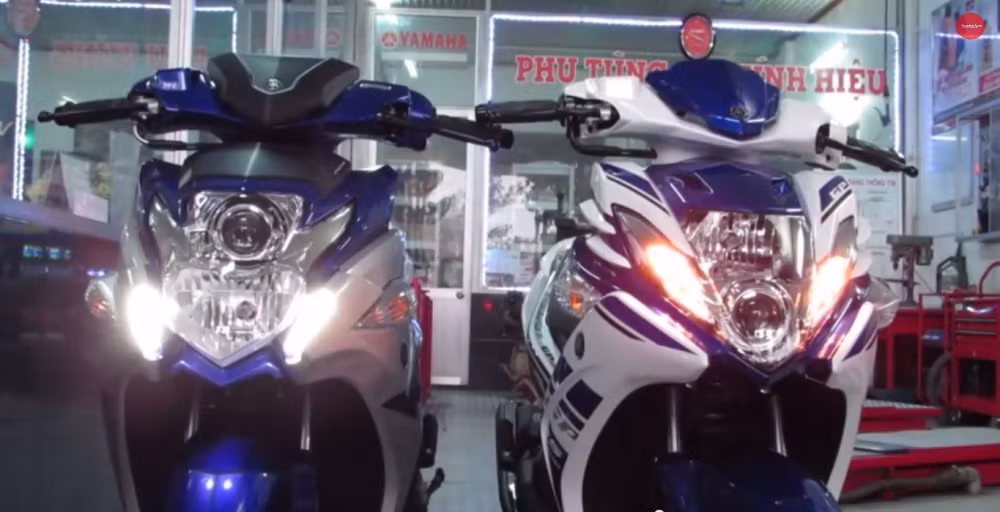 So sanh chi tiet Yamaha Nouvo SX GP doi 2015 va 2014-Hinh-2