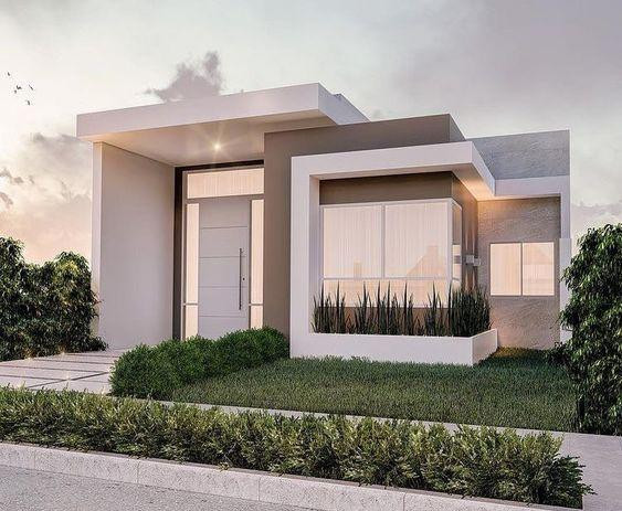 Mẫu nhà hình khối hiện đại, màu sắc đơn giản. Hệ thống cửa kính giúp đón ánh sáng tự nhiên cho căn nhà. 