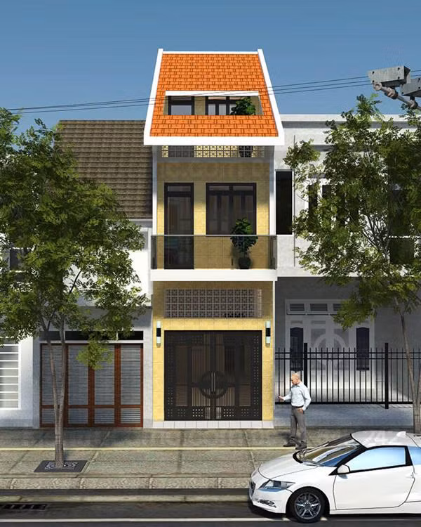 Căn nhà mái kéo bằng ngói mang lại nét đẹp cổ kính. Phần giếng trời được thiết kế tinh tế giúp ngôi nhà đón nhiều ánh sáng tự nhiên hơn.