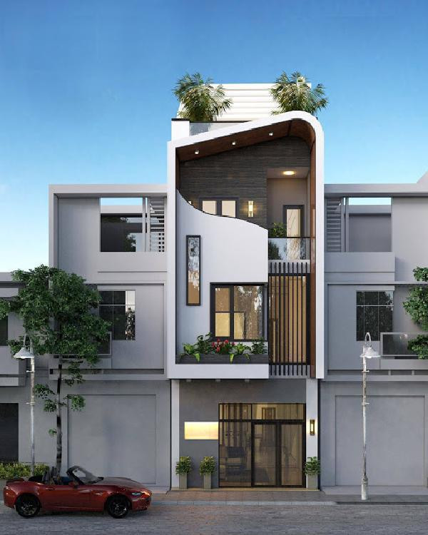 Mặt trước của ngôi nhà được thiết kế phá cách bằng những đường uốn lượn vừa hiện đại, vừa bắt mắt.