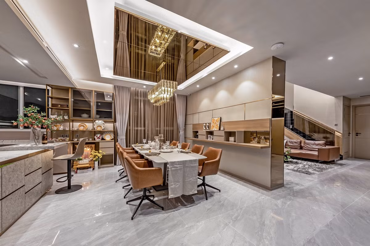 Khu vực phòng khách và bếp liên thông nhau để tạo cảm giác quây quần cho các thành viên.