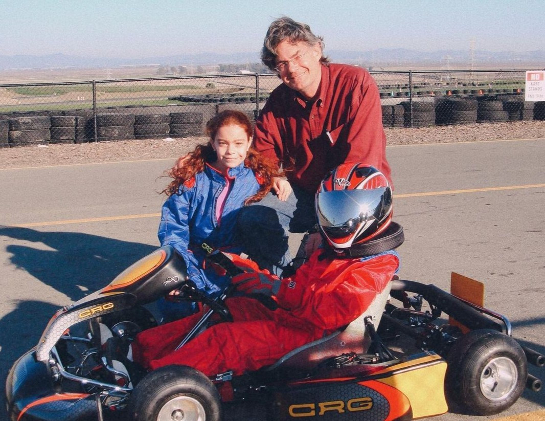 Breidinger đã nghiện lái xe từ khi còn nhỏ. Cha chính là người khơi dậy niềm đam mê trong cô và chị gái Annie (cũng là một tay đua) khi ông mua cho họ những chiếc xe go-kart.