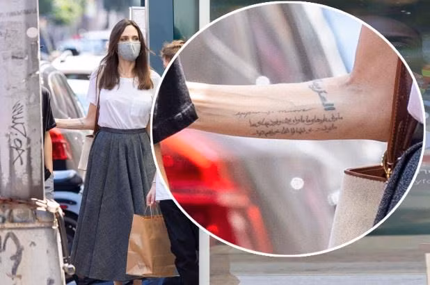 Y nghia cua gan 20 hinh xam tren co the Angelina Jolie-Hinh-3