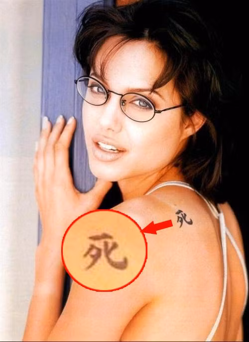 Y nghia cua gan 20 hinh xam tren co the Angelina Jolie-Hinh-5