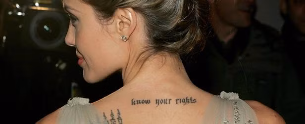 Y nghia cua gan 20 hinh xam tren co the Angelina Jolie-Hinh-7