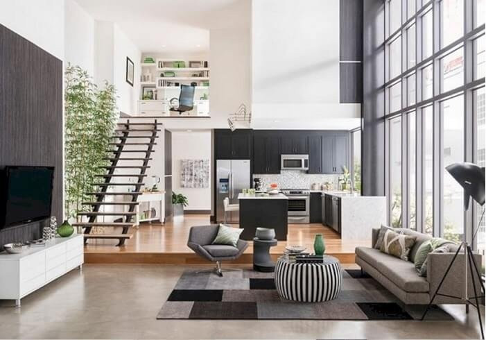 Gác lửng của căn hộ này nằm bên trên phòng bếp và được sử dụng làm góc học tập của trẻ nhỏ, góc làm việc của người lớn. Cầu thang lên gác lửng không có tay vịn giúp mang đến sự thoáng đãng cho không gian.