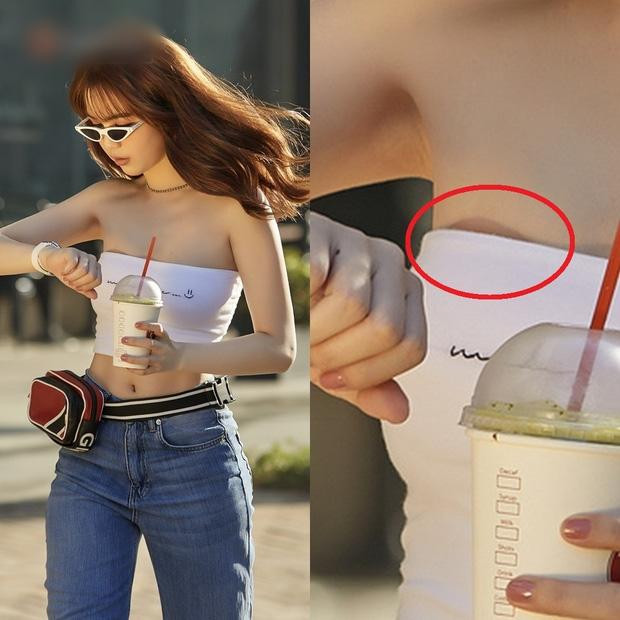 ức ảnh bỗng kém sang hẳn vì "vật thể lạ" lòi ra khỏi áo.