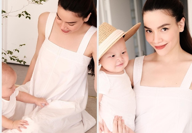 Thổi làn gió vintage vào thời trang mặc nhà, bà xã Kim Lý chọn chiếc váy dáng suông rộng từ vải thô trắng. Với chất liệu thoáng mát, thiết kế 2 dây to bản được cô chọn mặc trong rất nhiều dịp.