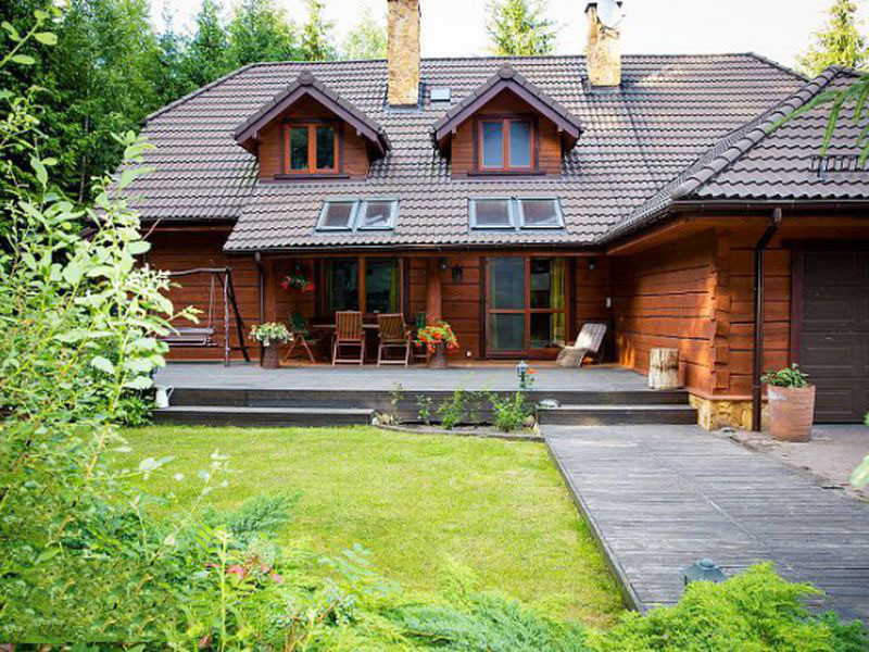 Mẫu nhà gỗ cấp 4 hình chữ L vừa có tính thẩm mỹ cao, vừa đảm bảo công năng sử dụng