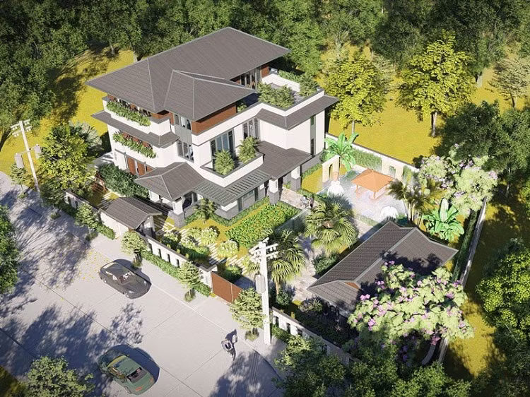 Nhìn tổng thể, căn biệt thự phong cách tân cổ điển này có một bố cục chặt chẽ, mái thái được xếp chồng lên nhau, đường nét đơn giản nhưng ấn tượng khi được đan xen với gam màu xanh của cây cỏ