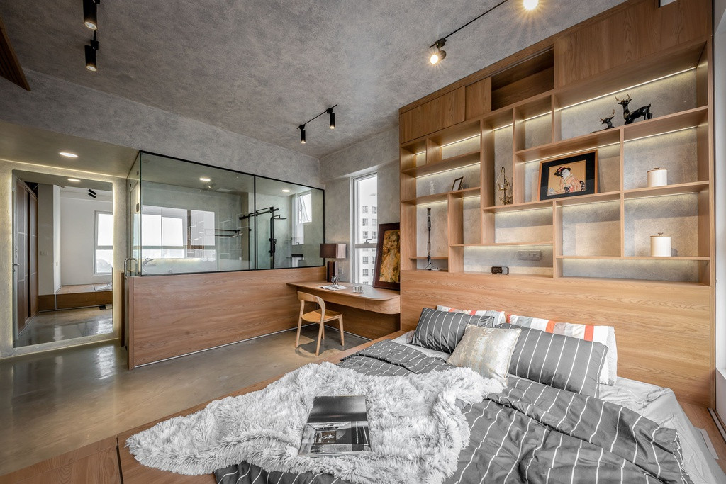 br/> Phòng ngủ có diện tích lớn nhưng chỉ có những đồ nội thất thật sự cần thiết, thêm sự hỗ trợ từ thiên nhiên với nguồn ánh sáng và gió trời thông qua cửa sổ lớn.