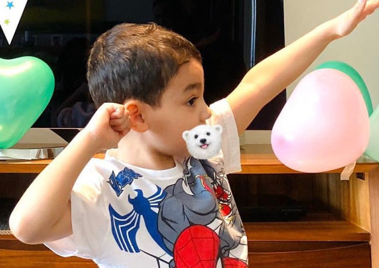 Hành động đáng nể của con trai Thu Minh khi nhận xấp lì xì dày cộp - Hình 7 Hanh dong dang ne cua con trai Thu Minh khi nhan xap li xi day cop-Hinh-7