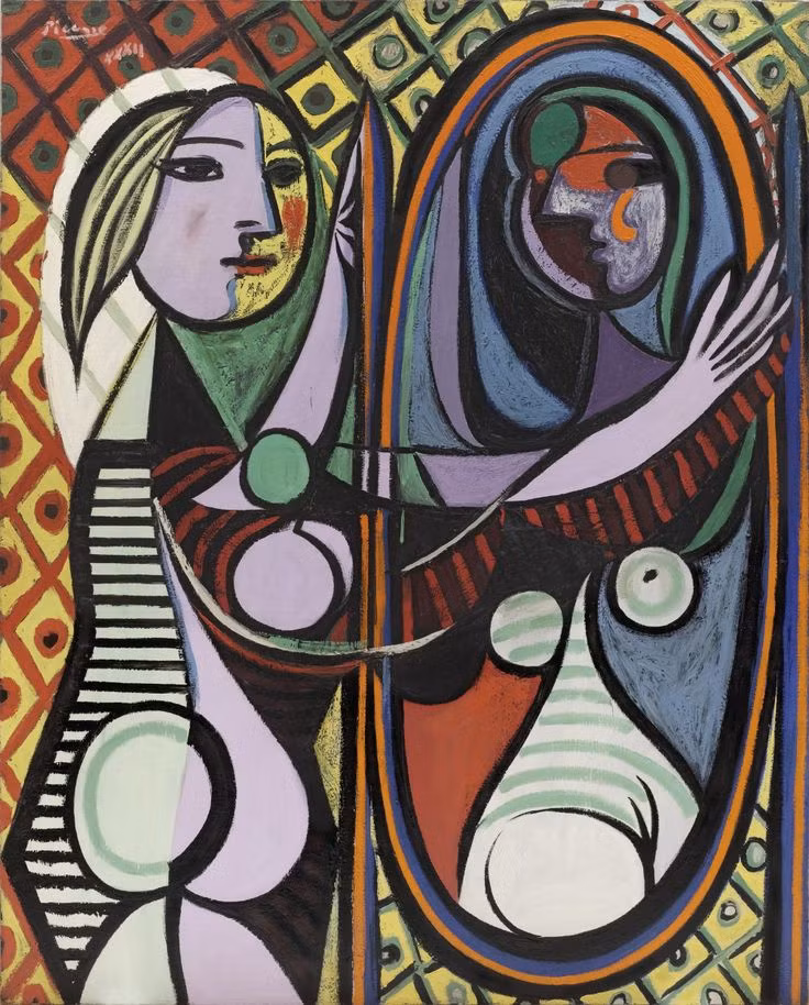  4. Girl Before a Mirror (1932). Đây là một trong những tác phẩm tiêu biểu của Picasso về chủ đề phụ nữ, với hình ảnh một cô gái đang nhìn vào gương, phản chiếu sự mâu thuẫn giữa thực tại và cái tôi bên trong. Ảnh: Pinterest.