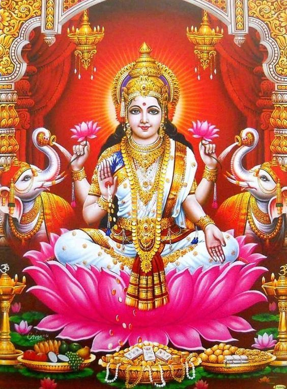  4. Lakshmi – Nữ thần của sự Giàu có và Thịnh vượng. Lakshmi là vợ của Vishnu và là nữ thần của sự thịnh vượng, giàu có và may mắn. Bà thường được thờ cúng vào dịp lễ Diwali và được miêu tả đứng trên một hoa sen, với những đồng tiền vàng rơi ra từ tay. Ảnh: Pinterest.Ảnh: Pinterest.