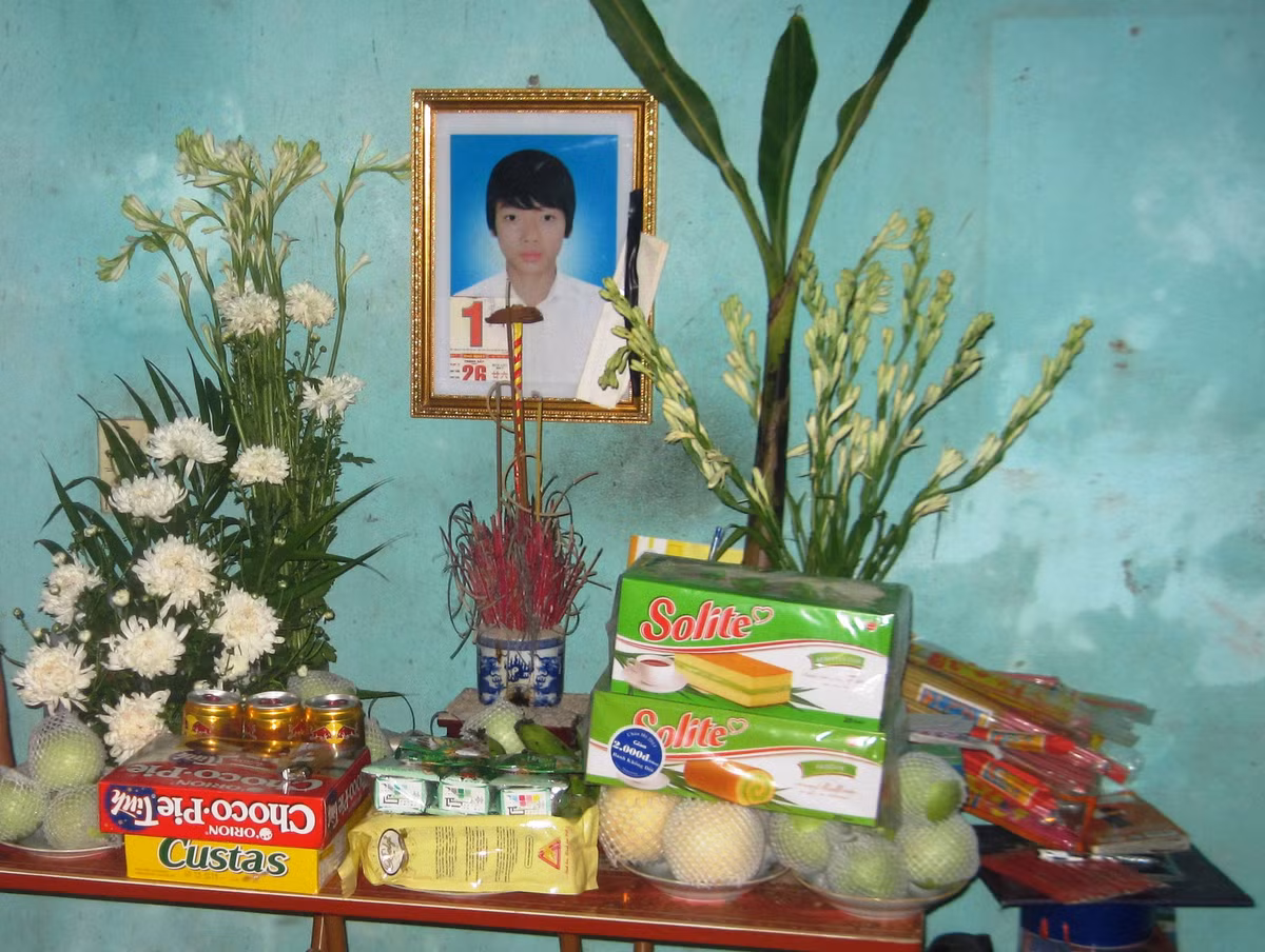 Di ảnh nạn nhân Vũ Doanh Nghiệp.