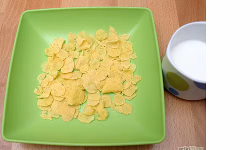 Cho trẻ ăn ngũ cốc cùng sữa. Chúng sẽ hứng thú với sữa nhiều hơn.