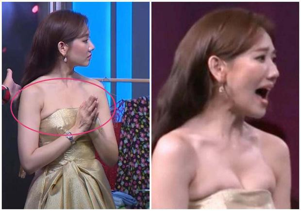 ##ss###style="text-decoration: underline;">Hari Won gây thấp thỏm vì vòng một như sắp bị đè nát bởi viền váy áo. Chiếc váy còn làm ngực nữ ca sĩ "chạy" sang hai bên nách.