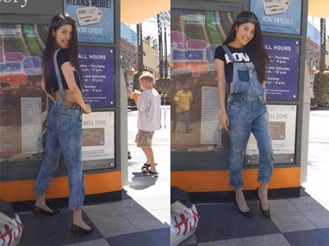 Quế Vân cũng khéo léo mix đồ cá tính và khá kín đáo với crop-top cộc tay cùng với quần yếm cá tính.